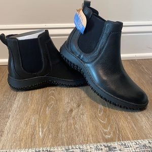 Never Worn!! Black waterproof boots.